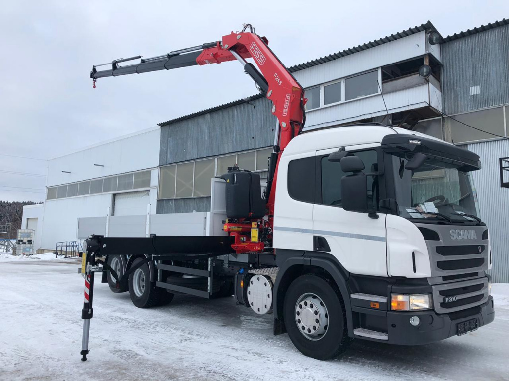 Бортовые автомобили с КМУ: за кабину или на задний свес?